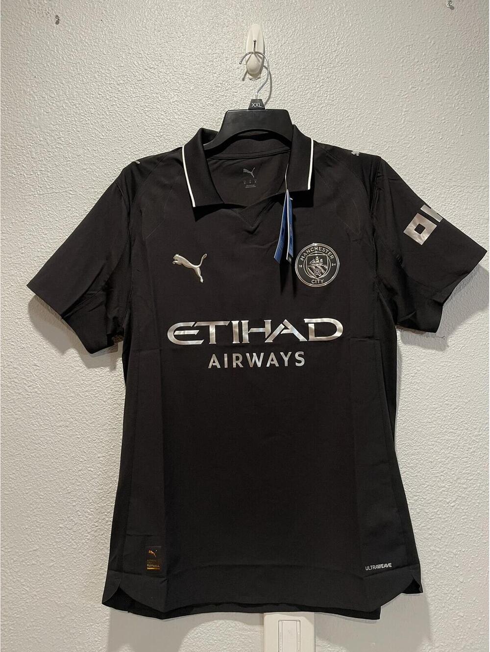 Manchester City Black Puma Soccer Jersey with Etihad Airways